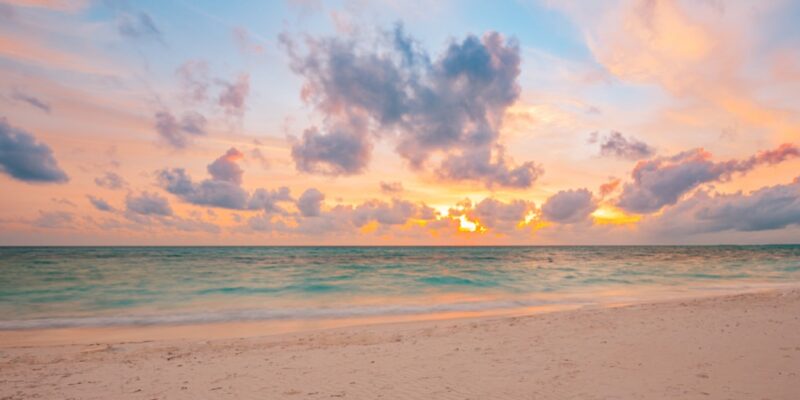 Sea sand sky concept, sunset colors clouds, horizon, horizontal background banner. Inspirational nature landscape, beautiful colors, wonderful scenery of tropical beach. Beach sunset, summer vacation